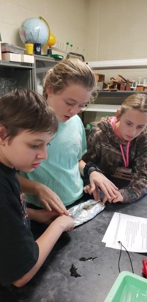 8th Grade Science Students Model the Rock Cycle